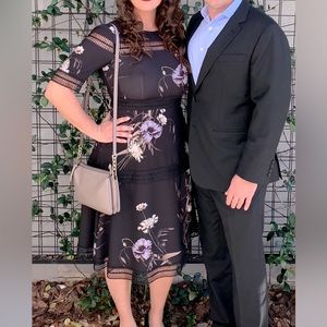 Black midi dress with unique lace and wildflower print